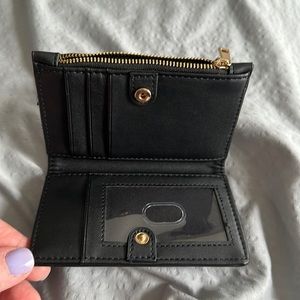 A New Day wallet. Used once.